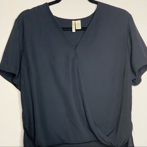 Black short sleeve chiffon v-neck top. NEVER WORN